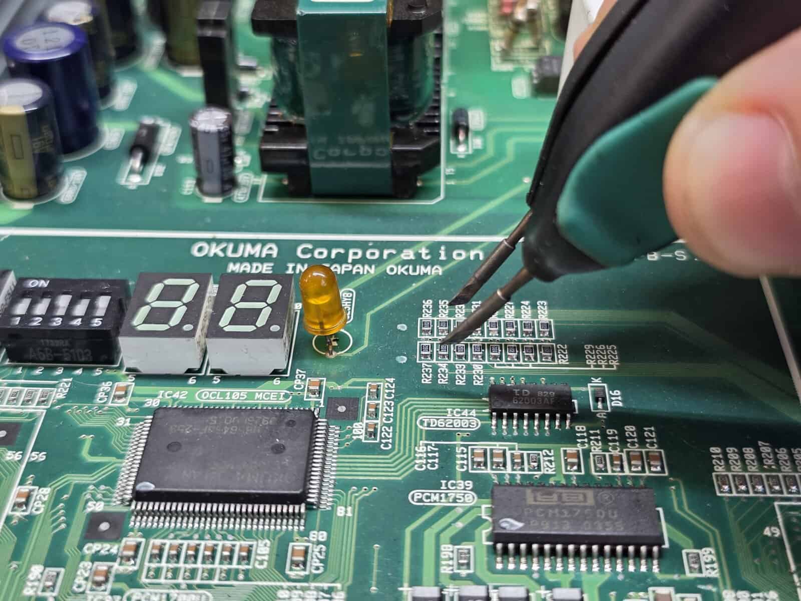 Okuma CNC machine for electronics repair, diagnostics and spare parts service
